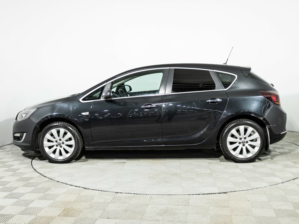 Б/У Опель Астра 2013 года. Фото: #5